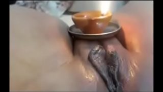 Deepam on shaved puku of nude aunty